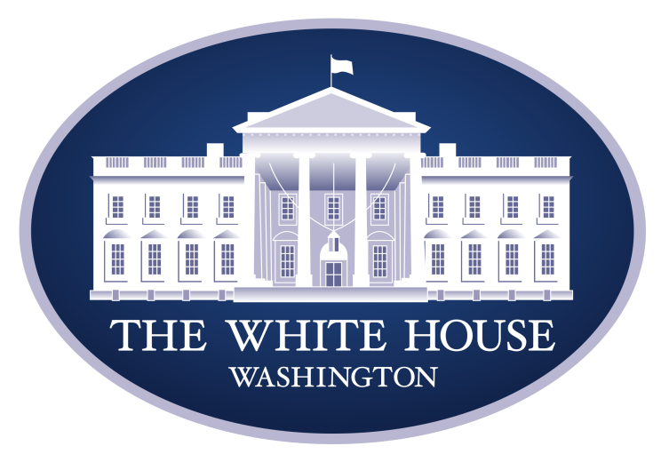 Logo for The White House with a cartoon of the white house building in a navy blue oval and white text that reads "The White House Washington"