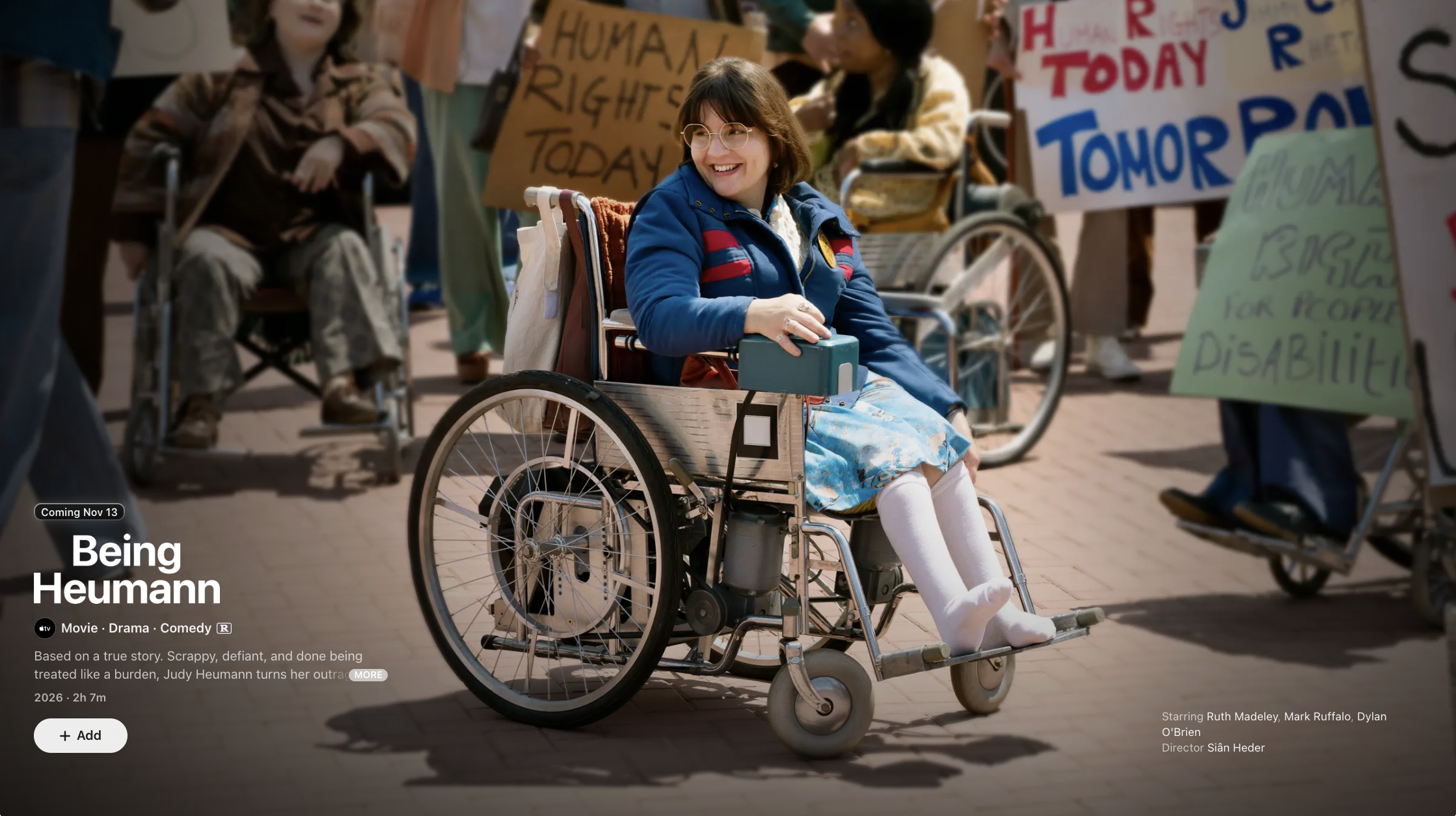Film still of Ruth Madeley as Judy Heumann at the 504 Sit-In. Text reads “Being Heumann. Coming Nov 13. Movie. Drama. Comedy. Rated R. Apple TV.”